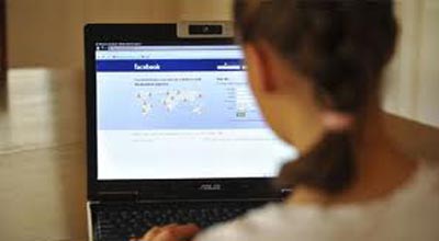 Qadınların Facebookda şekil paylaşması haramdı